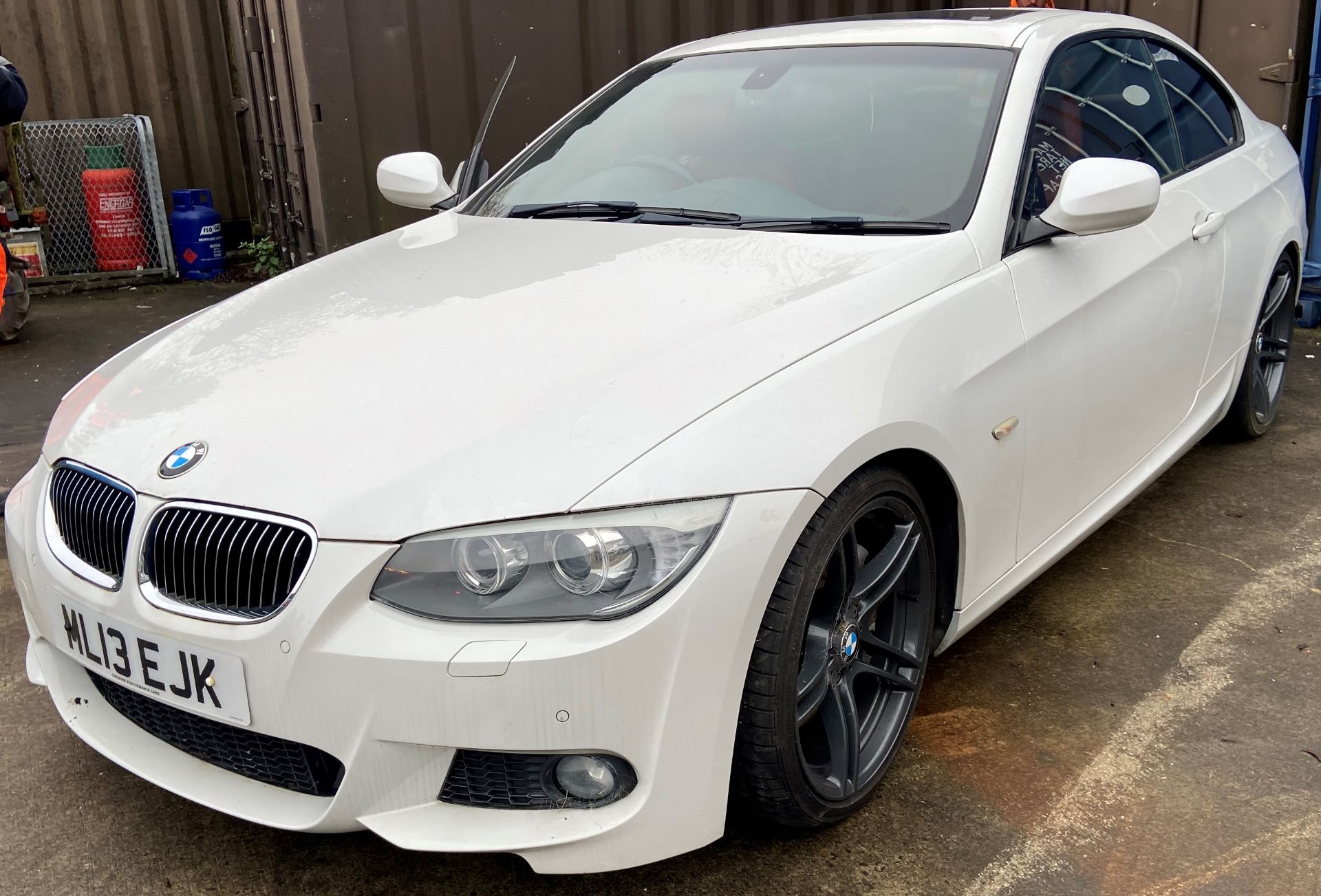 BMW 3.0 335DM Sport Automatic Coupe - diesel - white - black alloys and red leather interior.