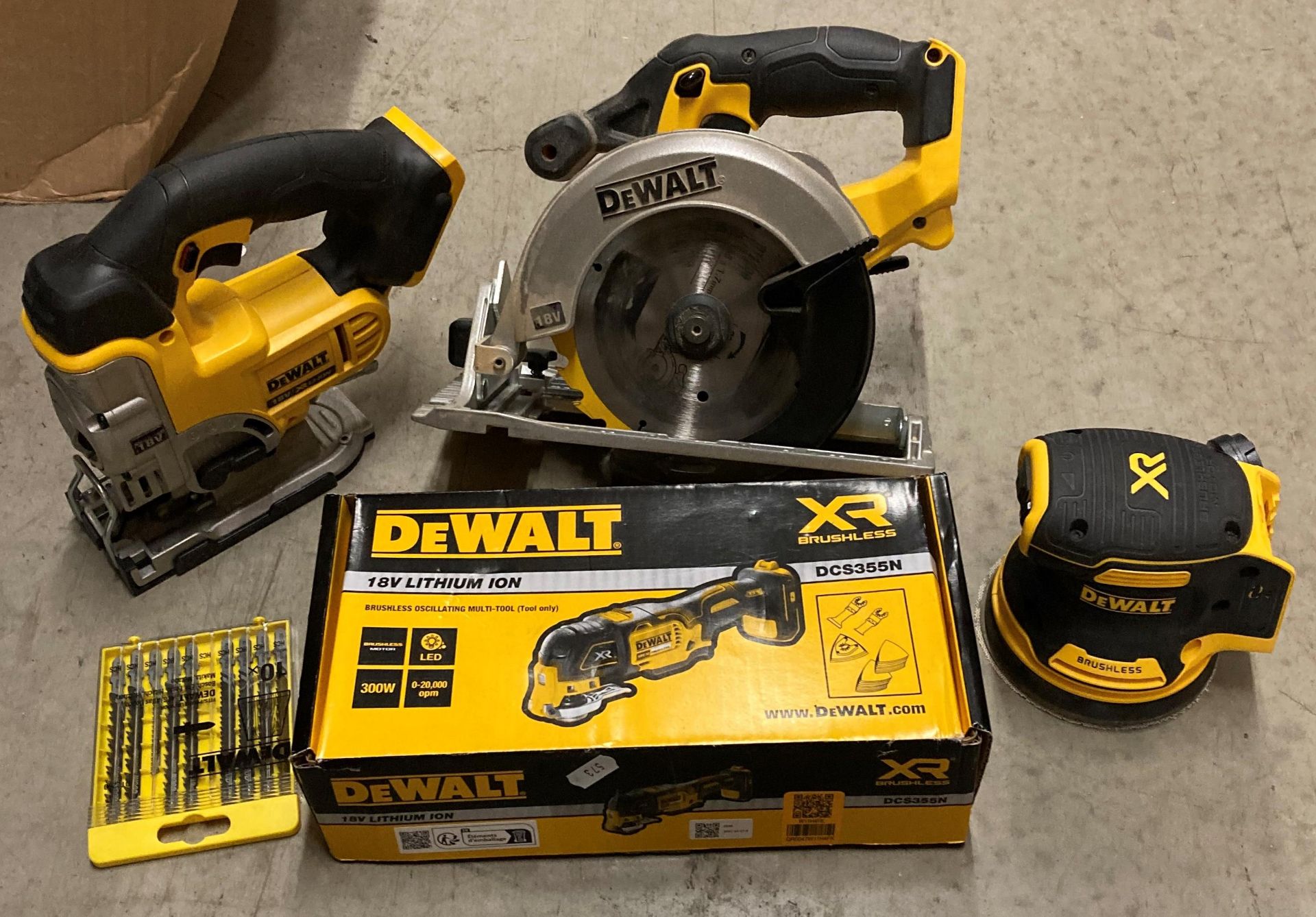 Four assorted 18v DeWalt cordless hand tools including multi-tool DC5355N, XR DCW210 pad sander,