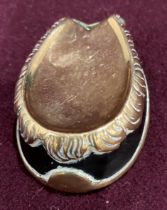 A patinated and polished brass horse hoof vesta case 6cm long (saleroom location: S3GC02)