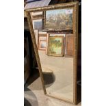 A gilt framed wall mirror - 83 x 34cm (saleroom location: gallery)