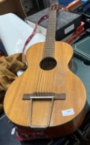 A vintage Gitarre Lautklang German six string acoustic guitar 93cm long, (damage to back),