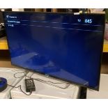 A Sony KDL 42W705B 42" flat screen TV complete with adapter and remote control (saleroom location: