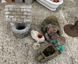 A small concrete garden ornament well, a fox and hedgehog garden planters (2),