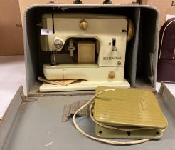 A Berlina 600 240v portable sewing machine (plug cut off - not tested) in carry case (saleroom