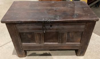 A small oak three panel chest with lift top 82 x 52 x 42cm high