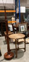A turned wood standard lamp and a circular oak table with folding base (2) (Saleroom location: ROT)