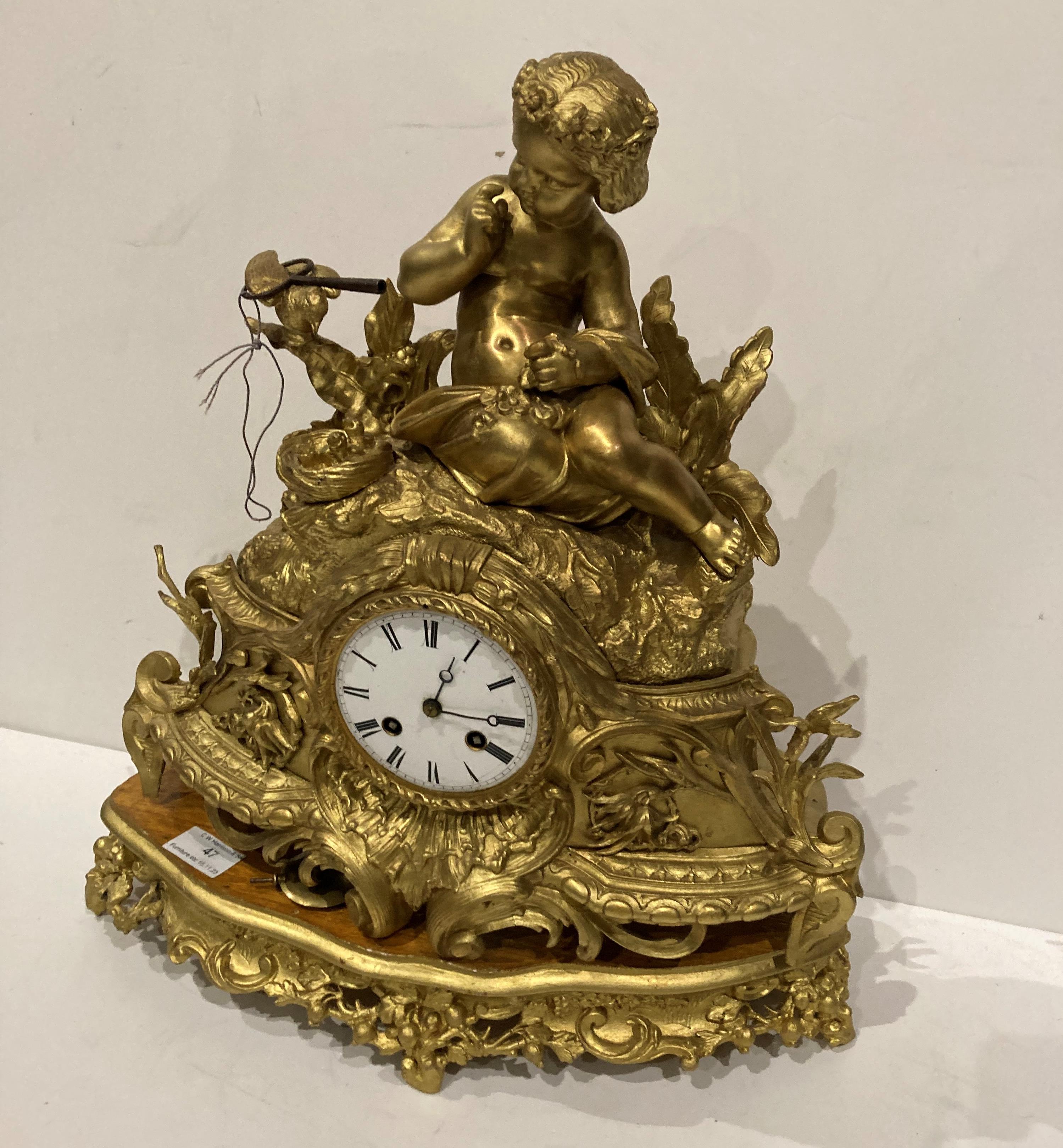 A gilt finish figural mantel clock surmounted by a young girl and mounted on plinth - 45cm high - Image 5 of 9