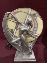 A Rosa reproduction Deco style table lamp in the form of a dancing lady in front of a leaded