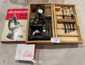 A Bijou children's microscope in box complete with book and a box of glass slides (Saleroom