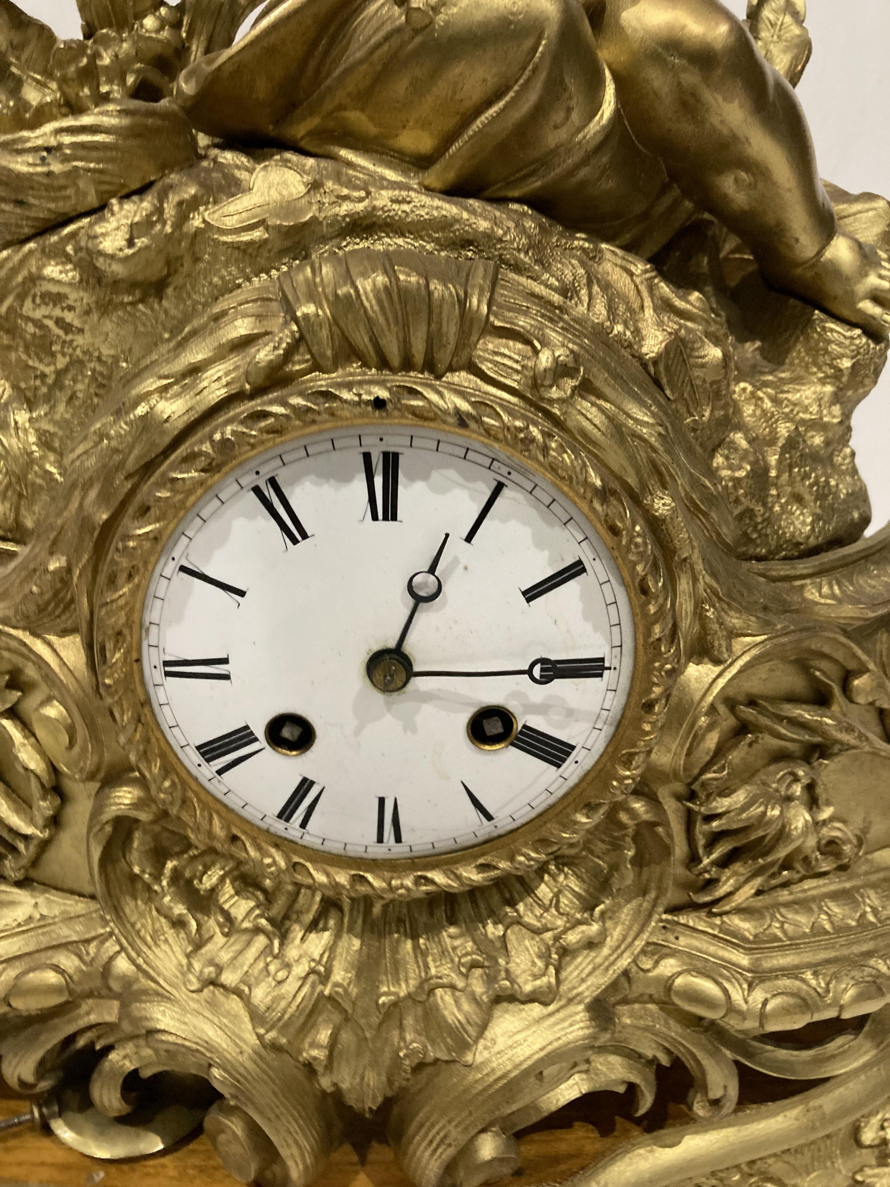 A gilt finish figural mantel clock surmounted by a young girl and mounted on plinth - 45cm high - Image 4 of 9