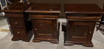 A pair of dark mahogany single-drawer single-door bedside cabinets (each 55 x 40 x 56cm high) and a