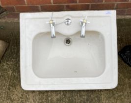 A white ceramic sink unit, no pedestal,