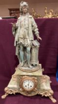 A metal with verdigree finish and green patterned marble figural mantel clock with plaque 'Raphael'