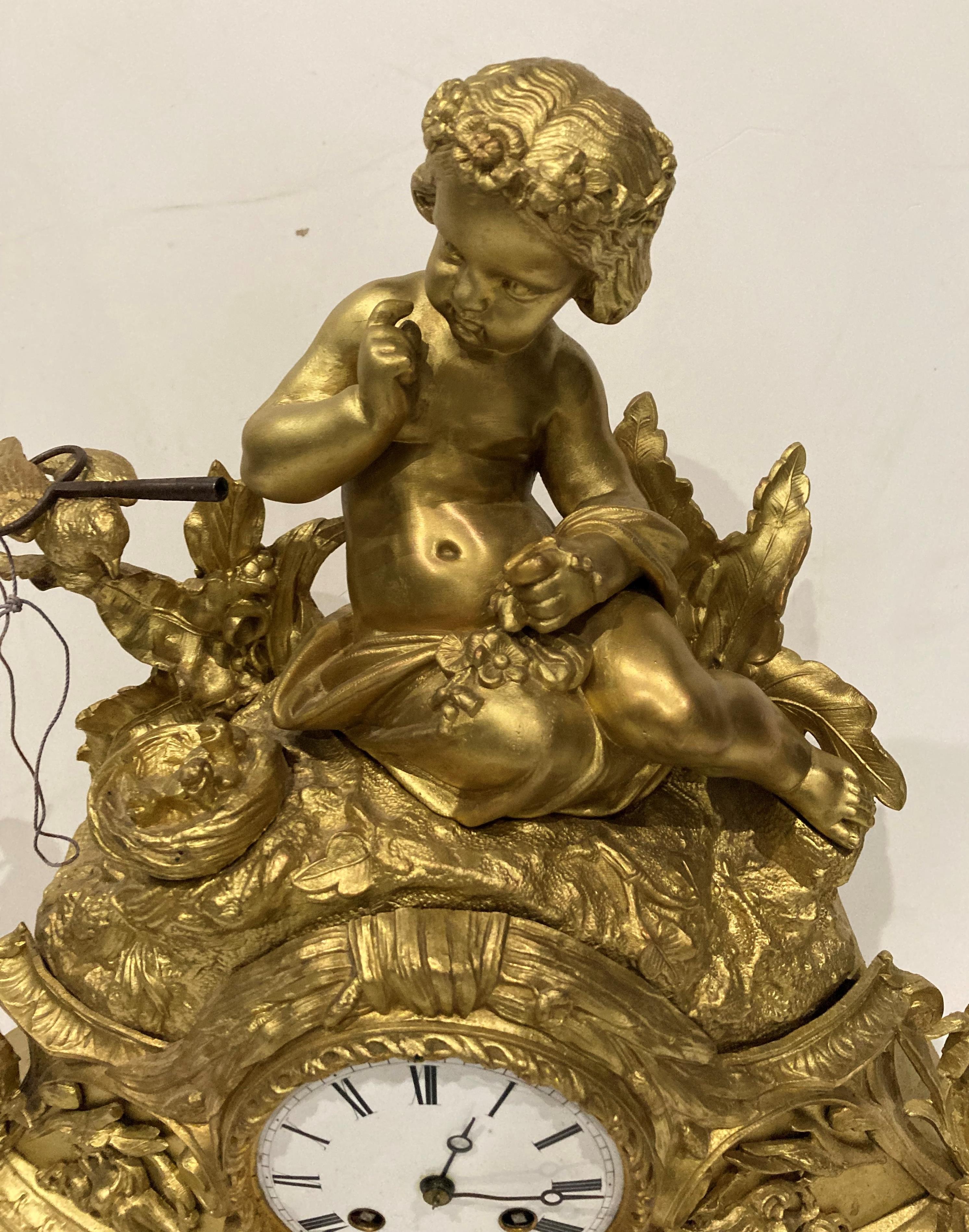 A gilt finish figural mantel clock surmounted by a young girl and mounted on plinth - 45cm high - Image 3 of 9