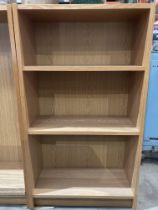 Pair of wood finish two shelf open front bookcases each 60 x 28 x 106cm high (saleroom location: