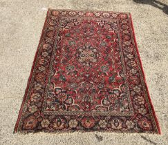 An Oriental style rug in blue and red size 131 x 198cm (saleroom location: MA4)