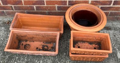 Four terracotta planters and three plant pots (saleroom location: outside)