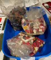 Contents to tray - two bags of Lego and a bag of plastic cowboys and American Natural Indians