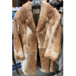 A Dysons Furiers Ltd Leeds light brown long fur coat (no size shown) (saleroom location: S3 rail)