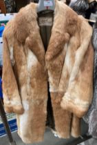 A Dysons Furiers Ltd Leeds light brown long fur coat (no size shown) (saleroom location: S3 rail)