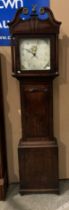 A 19th century oak and mahogany longcase clock with a 30 hour movement, square painted face,