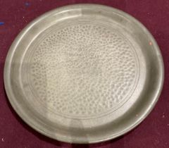 Sir Henry Fowler interest - a circular pewter plate by Knighthood Old English Pewter 23cm dia.