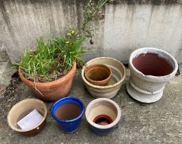 Seven various terracotta and glazed plant pots (saleroom location: outside)