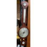 A walnut banjo-shaped barometer by Aylanbar? & Lambert,