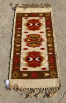 Persian multi-coloured rug 63 x 125cm (saleroom location: MA4)