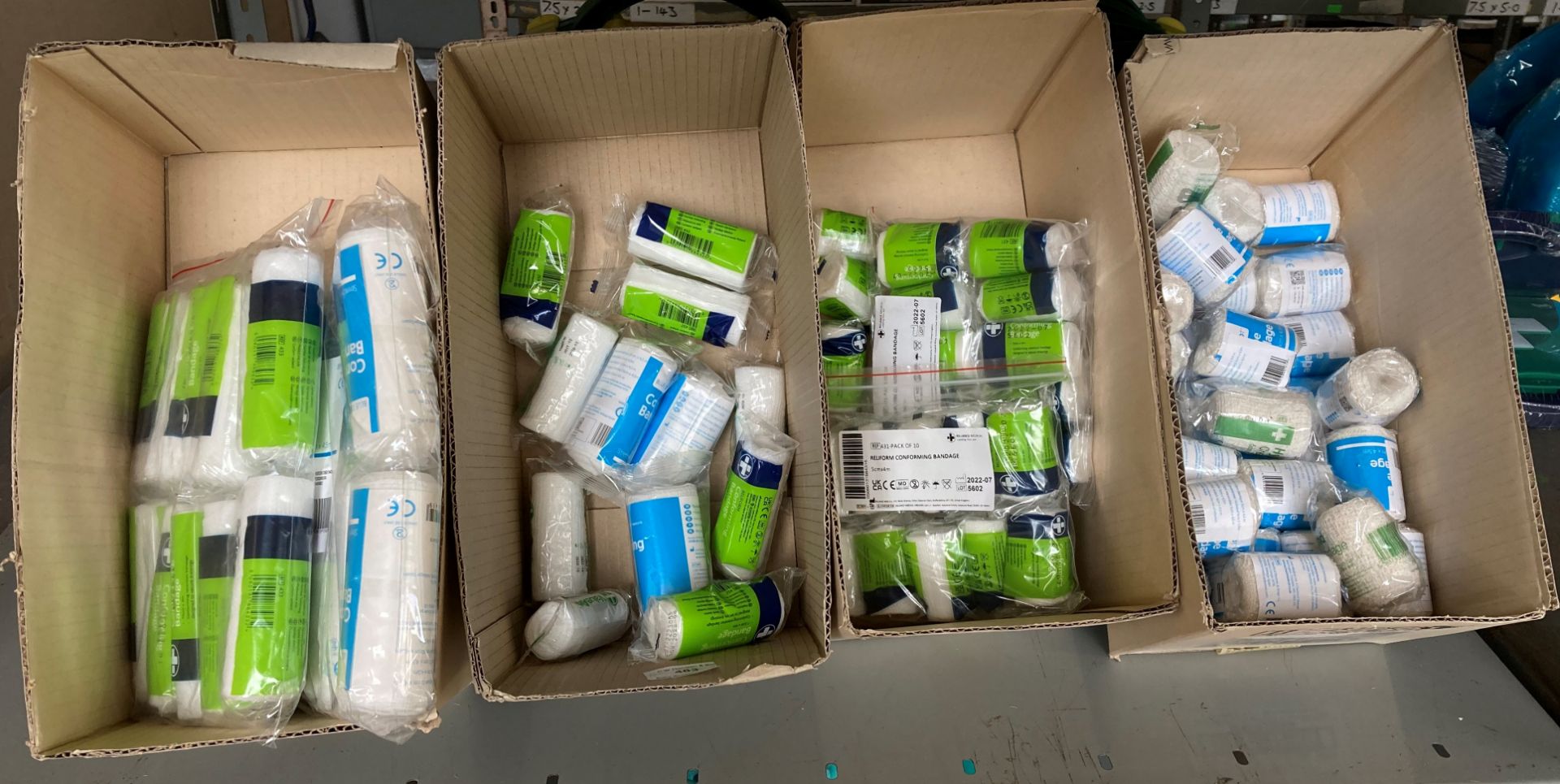 Contents to 4 x part boxes - large quantity of assorted bandages,