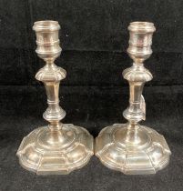 Pair of silver hallmarked candle sticks (dated 1975, London). Total weight - 23.