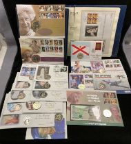 Two 'The Royal Family' folders with first day covers and coin first day covers,