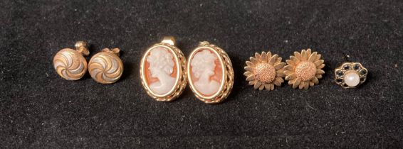 Three pairs of 9ct gold earrings including cameo pair and a single 9ct gold with central pearl