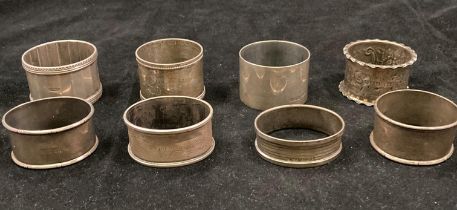 Eight assorted silver hallmarked napkin rings - total approximate weight 5oz (saleroom location: S3