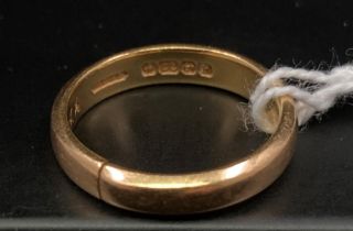 A 22ct gold wedding band (damaged - ring has been cut, size K, approximate weight 4.