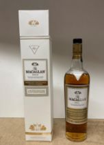 A nearly full bottle (original size 100ml) of Macallan Gold Highland Single Malt Scotch Whisky