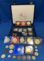 24-slot 'Historic Coins of Great Britain' case and 16 commemorative crowns and other coins