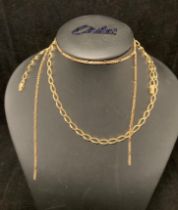 Two 9ct gold chains - one chain 21" long (no clasp) and a 21" thin figaro chain (broken) - total