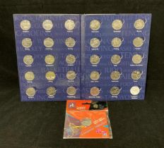 A London 2012 Olympic Sports 50p coin album complete with completer medallion in Royal Mint package