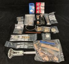 Contents to bag - a watch back removal tool and assorted watch spares and repairs including straps,