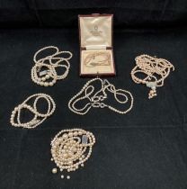 Six faux pearl necklaces (single and double strand - some damaged/broken) (saleroom location: S3