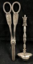 A pair of silver hallmarked grape scissors and a silver (hallmark worn) ladle with fox head handle