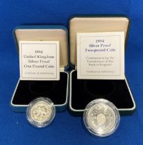 Two Sterling Silver silver-proof coins including 1994 one-pound coin,