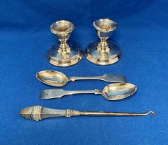 Five assorted silver hallmarked items including pair of small weighted base candlesticks holders