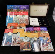 Sixteen piece Millennium 2000 coin collection set in display box and a wooden coin case with six