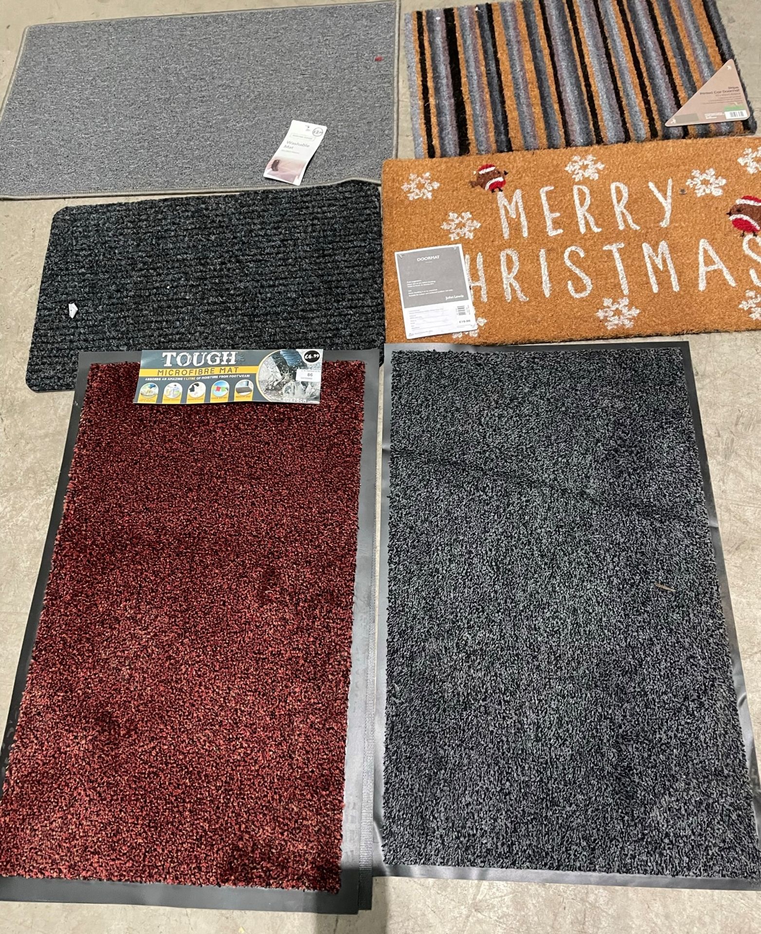 Contents to pallet - approximately 125 assorted mats to include coir 'Merry Christmas',