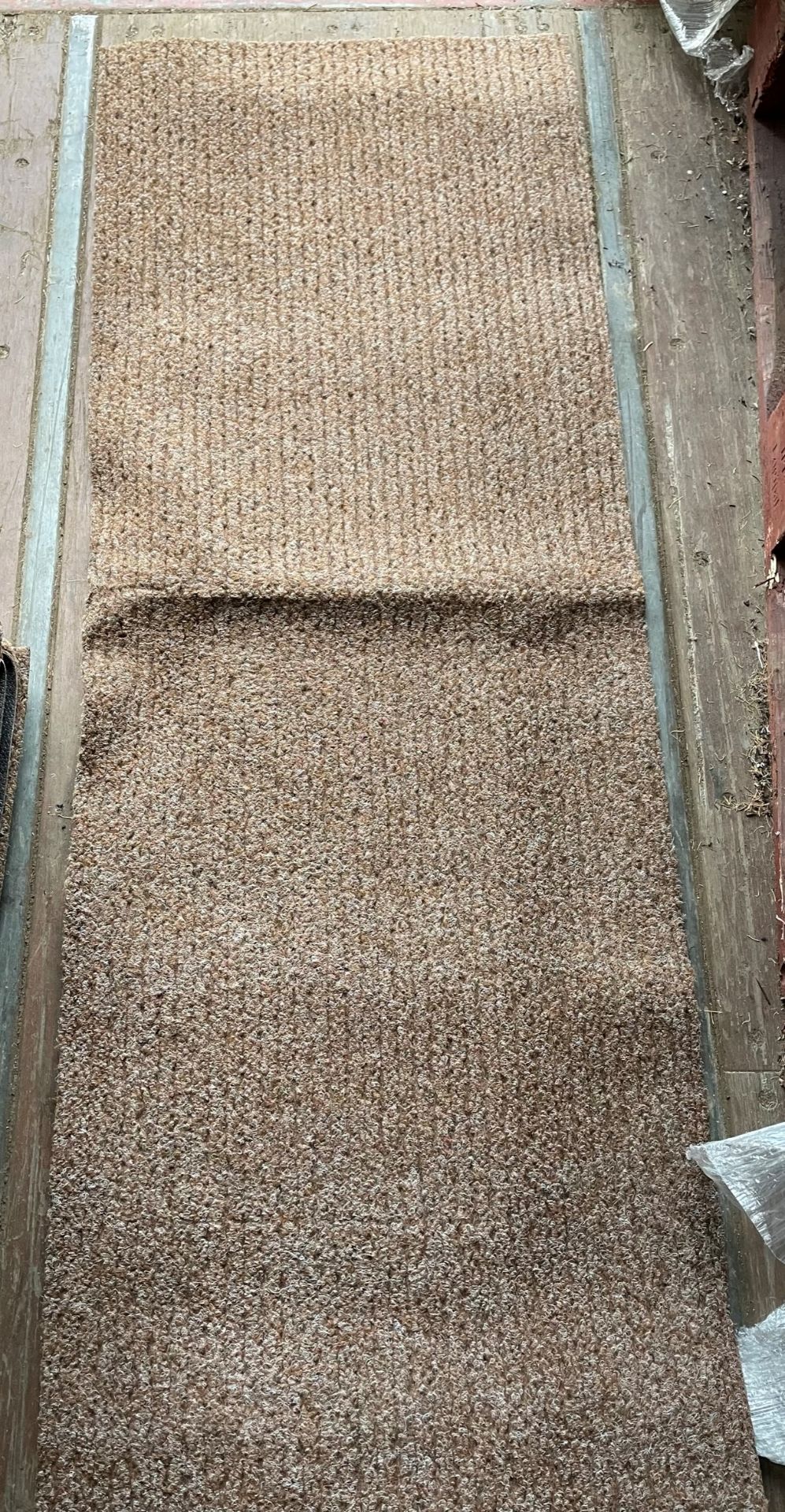 84 x ribbed brown fabric rubber backed runners 150 x 54cm (saleroom location: container A)