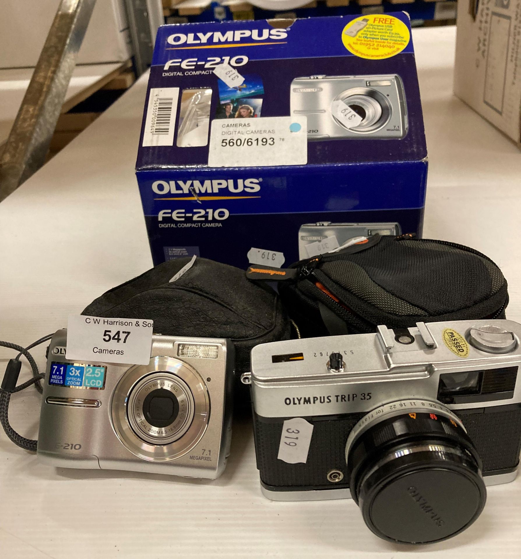 Olympus FE-210 compact digital camera, Olympus Trip 35 camera,