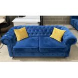 Blue upholstered button-backed Chesterfield style 2-seater sofa complete with cushions (saleroom