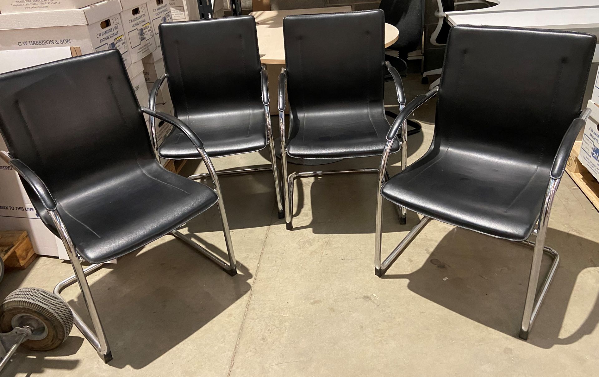 4 x Chrome framed black leather effect cantilever office/reception chairs (saleroom location: QD04)